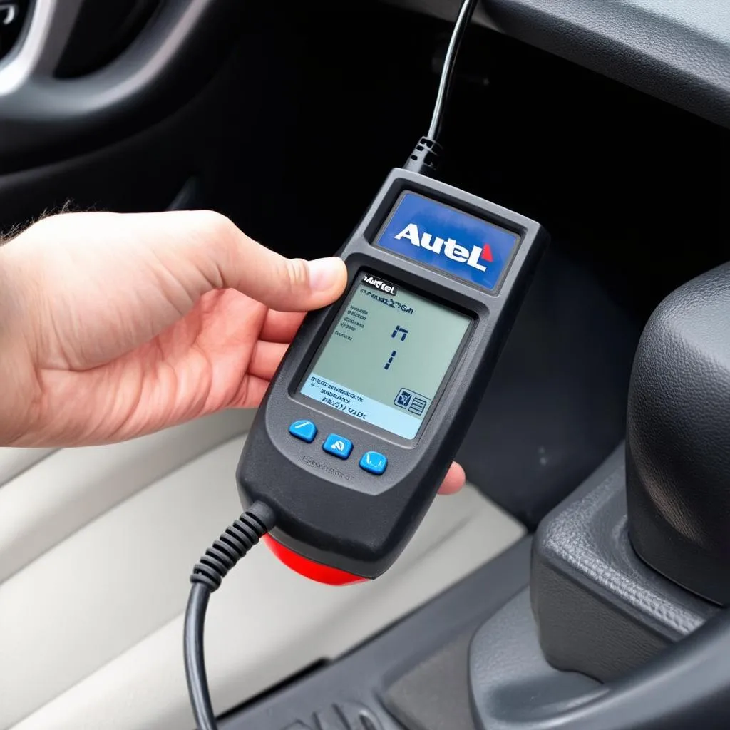 Autel MaxiScan OBD II Code Reader Scan Tool Connected to Car