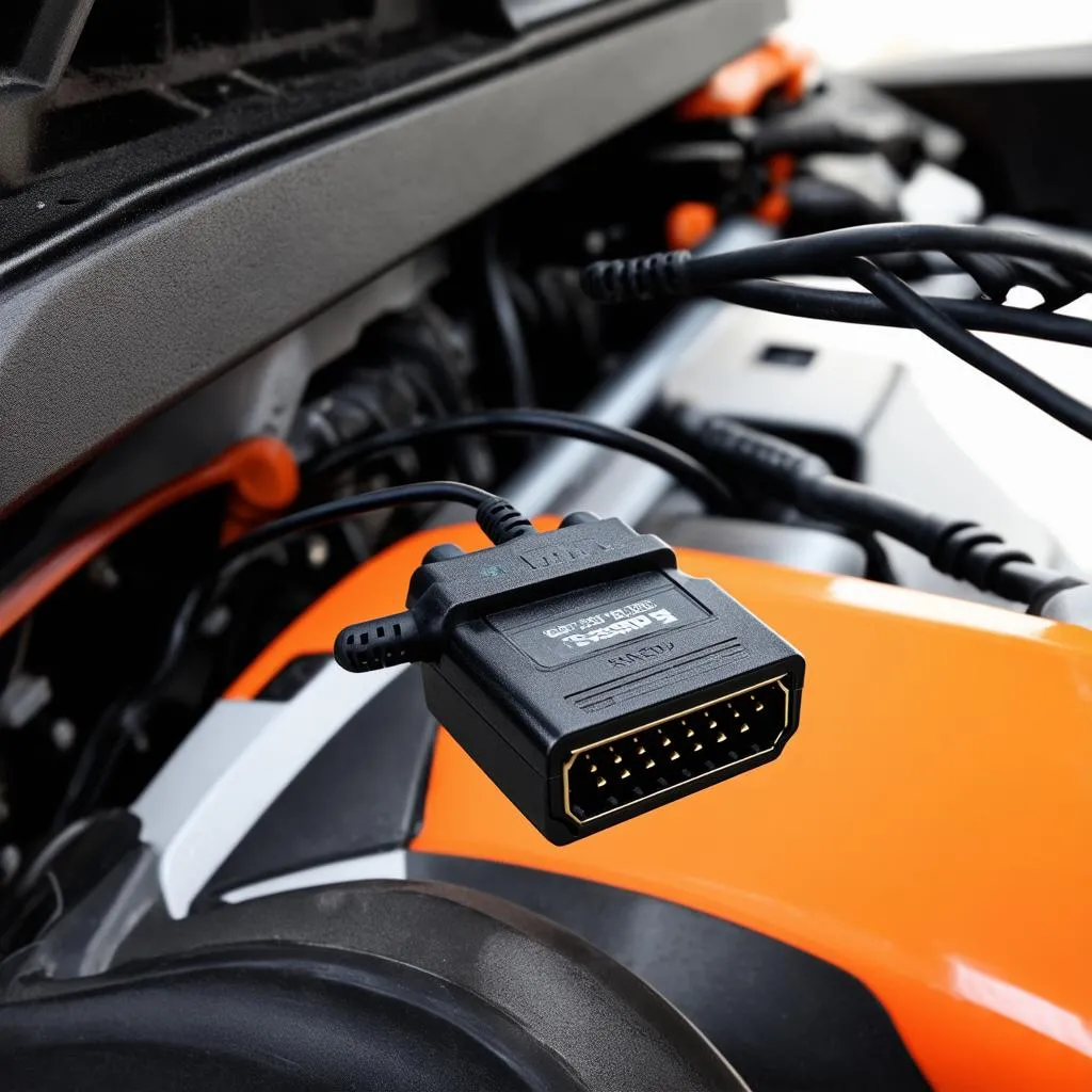 Un adaptateur OBD connecté au port d'un véhicule Can-Am