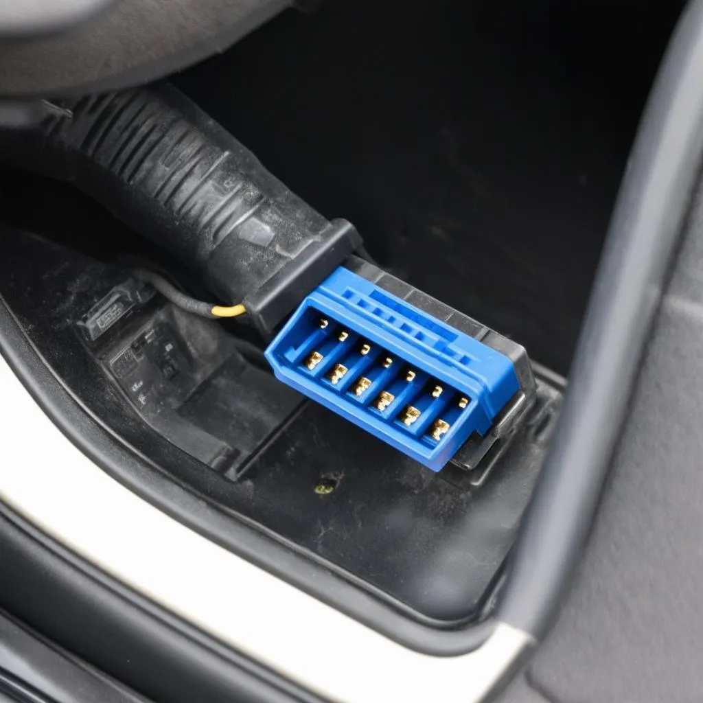 Ford Taurus OBD connector location