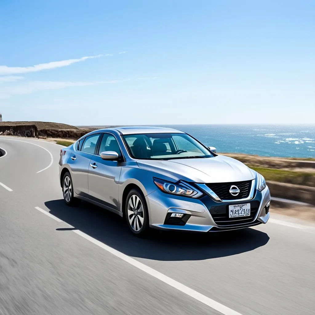 Nissan Altima 2016 driving on a coastal road