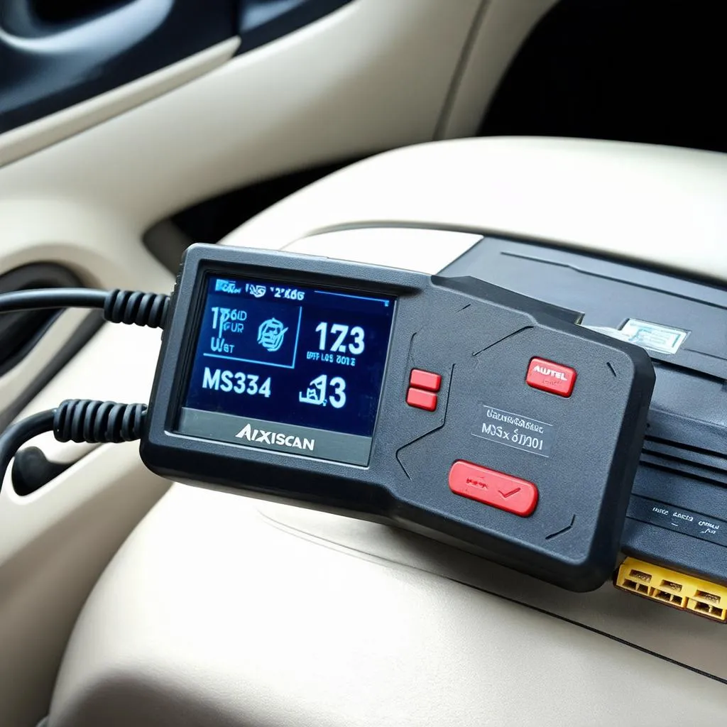 Autel MaxiScan MS310 connected to a car