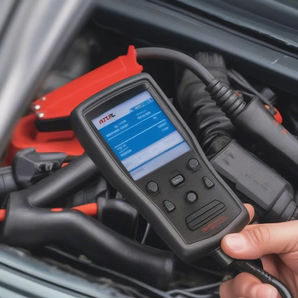 Scanner Autel connecté à la prise OBD-II d'un véhicule