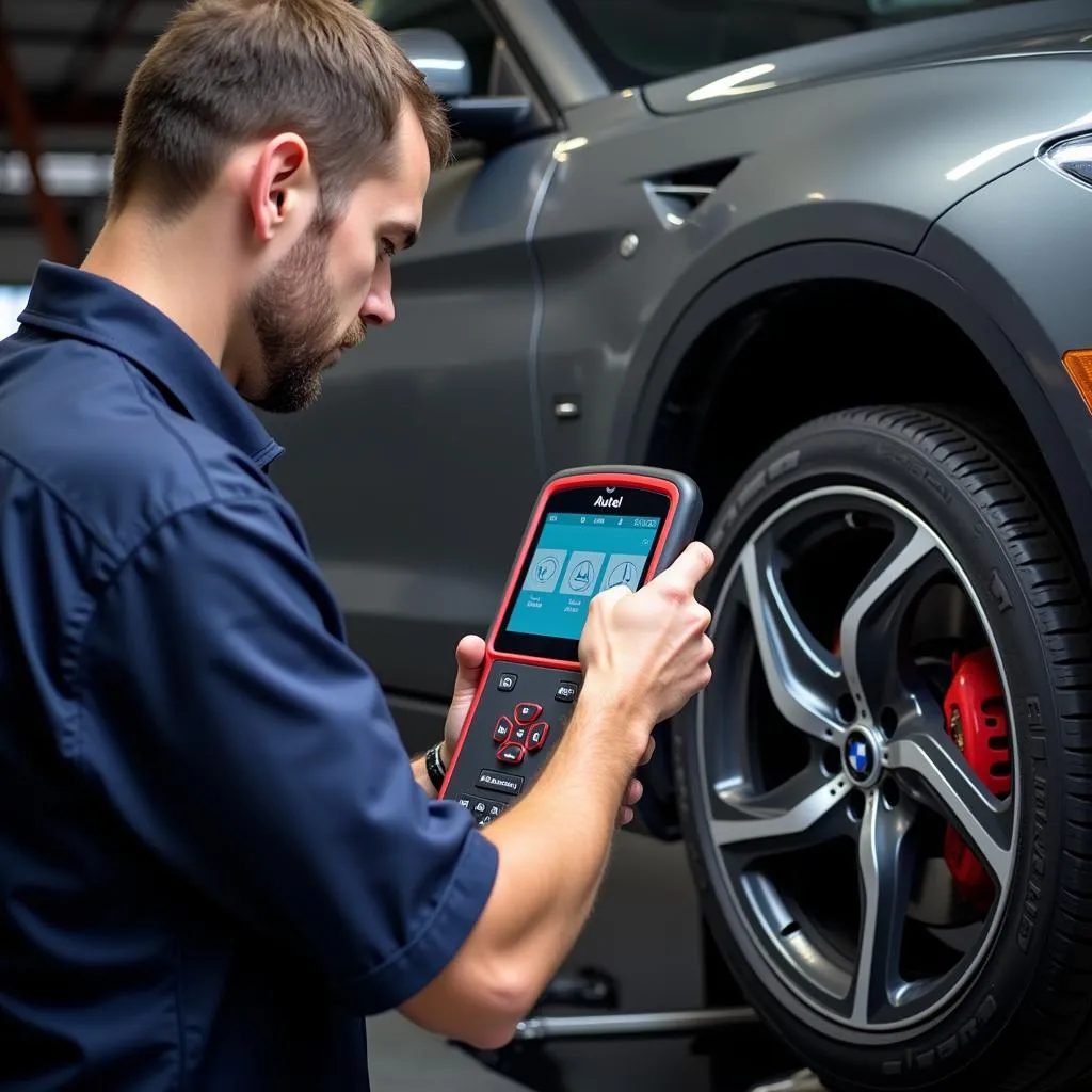 Un mécanicien utilisant un outil de diagnostic Autel