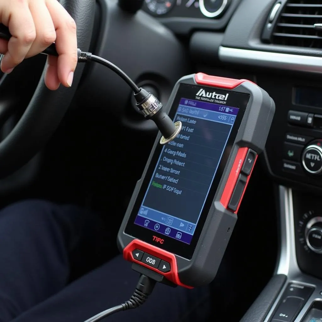 Outil diagnostic Autel MaxiSYS branché sur prise OBD