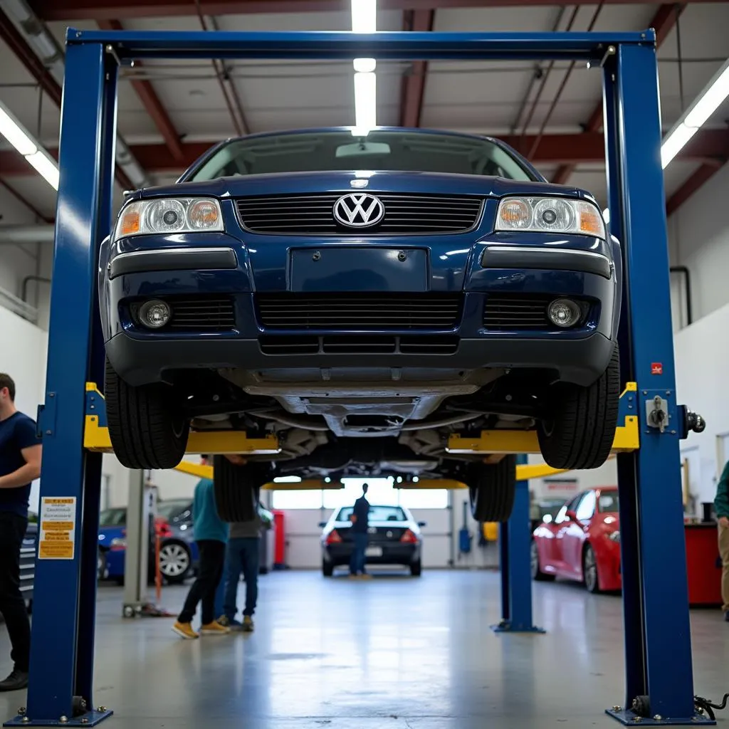 Voiture sur un pont élévateur dans un garage