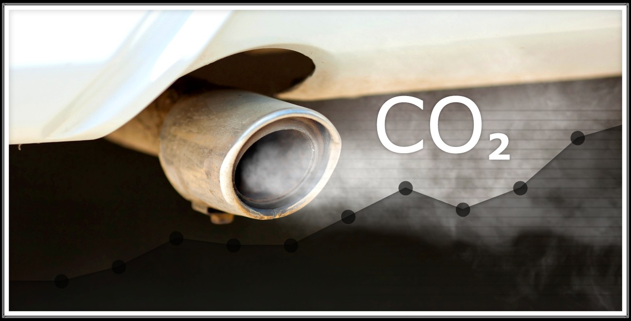 alt text: A car's tailpipe emitting exhaust fumes, representing traditional emission testing methods.