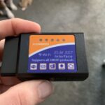 Kobra OBD2 Scanner connected to a car's OBD2 port